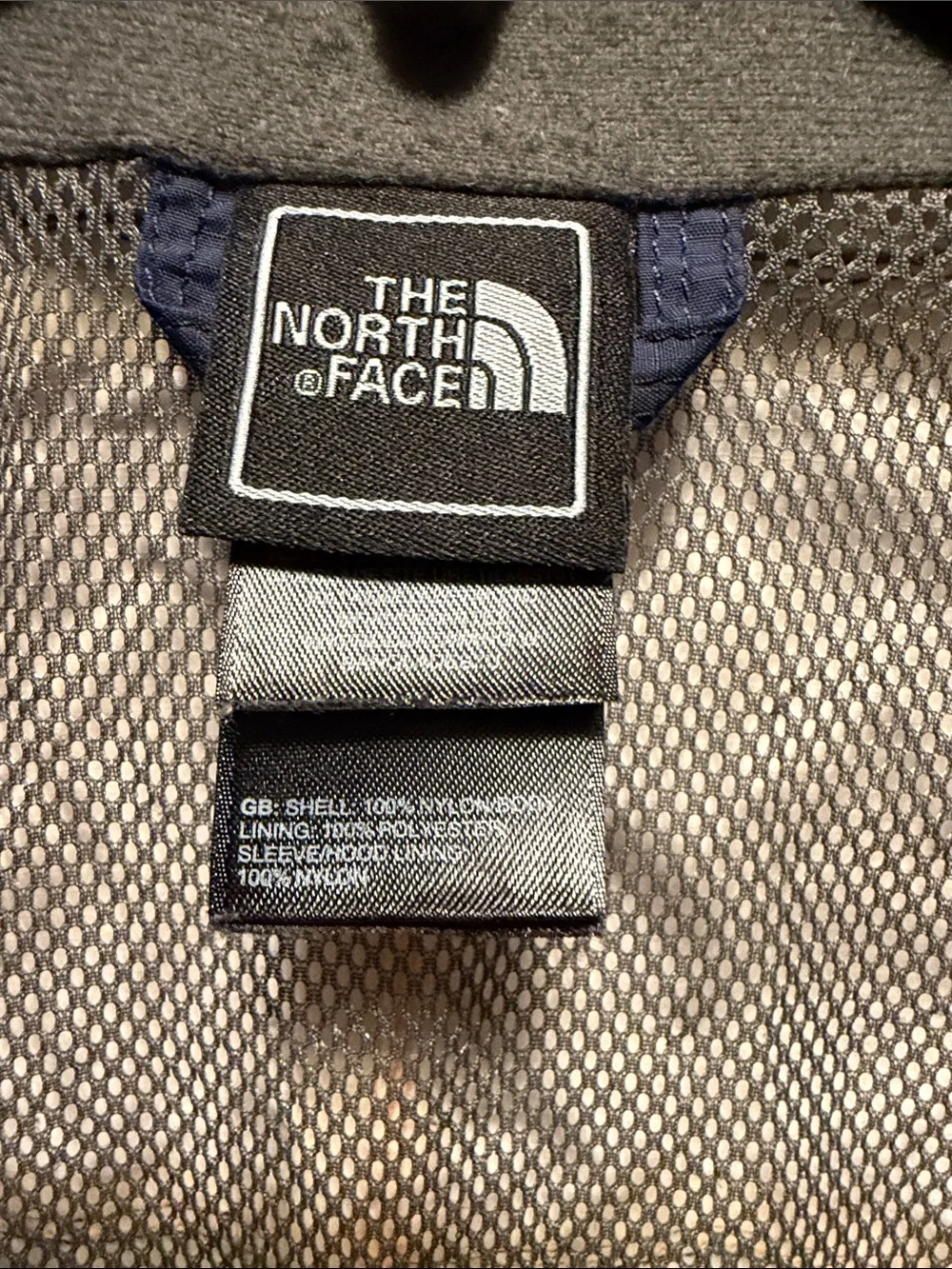 The North Face Kids Navy Blue and Orange Raincoat